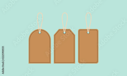 Sale tag design featuring blank price labels hanging strings and