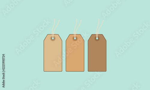 Sale tag design featuring three blank paper labels with strings in a