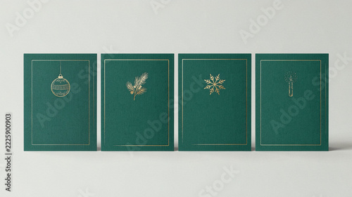 Premium Emerald Green Christmas Greeting Card Set with Champagne Gold Foil Bauble, Pine Branch, Snowflake and Candle Designs on Grey Studio Background