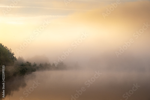 Morning fog on the lake, sunrise shot