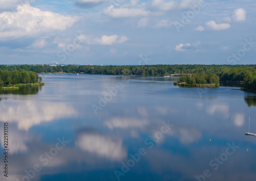Goczalkowice Lake reflecting blue sky and clouds in Silesian Voivodeship, Poland