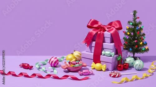 Christmas Gift Box Stack with Tree and Ornaments on Purple Background