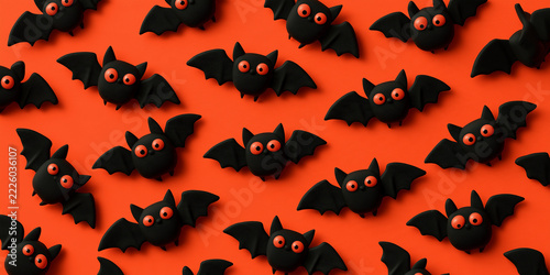top down view 3d cartoon Halloween black bat figures pattern isolated on a red background