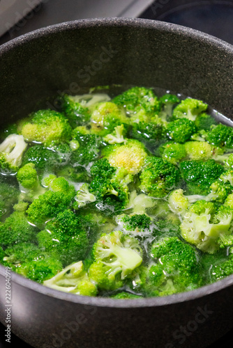 Green Broccoli Florets Boiling in a Pot of Water