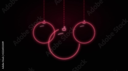 Neon christmas baubles drawing themselves on a black background