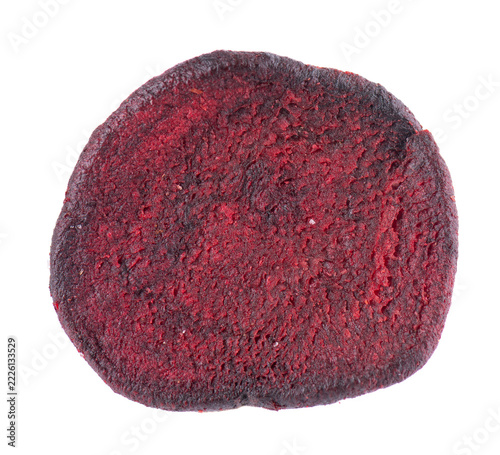 Crispy roasted beetroot chips with sea salt, isolated on white background. Healthy and crunchy natural vegetable snack. Clipping path.