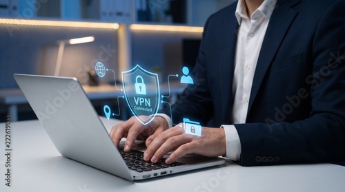 Professional businessman using virtual private network connection on laptop computer