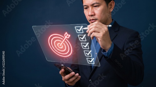 Businessman touching futuristic digital screen with target and checklist icons