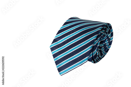 Classic Dark Navy Striped Luxury Silk Necktie Rolled on White Background.
