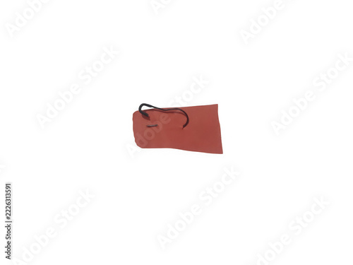 Red rectangular tag with black string isolated