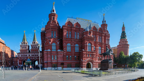 Moscow State Historical Museum and Kremlin towers under clear blue sky
