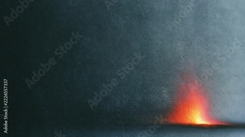 Abstract dark surface with glowing light