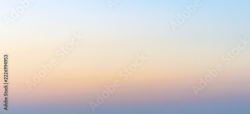 Smooth pastel gradient background featuring soft transitions of pale blue, warm peach, and muted lavender, ideal for minimalist graphic design and ethereal digital overlays.