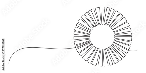 Fotografie Black and white toroid inductor coil electronic component
