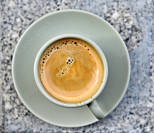 Overhead view of espresso crema in cup