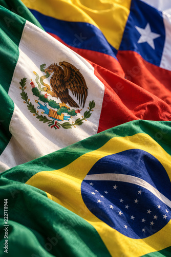 Latin American flags layered in windblown fabric