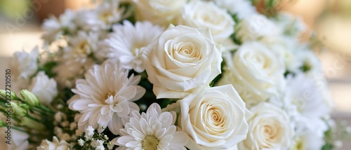 Elegant white roses and daisies bloom together