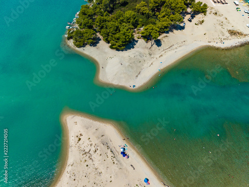 Obraz na plátně Aerial view of bathers wading at Glarokavos
