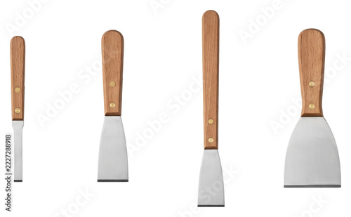 Obraz na plátně Wooden handled metal spatula set on transparent background