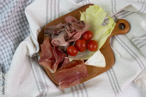 Cold Cut, Parma Ham , Platter with Cured Meats, Camembert, and Cherry Tomatoes
