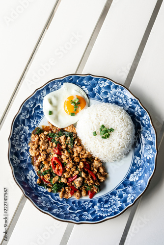 Obraz na plátně Pad kra prao gai spicy chicken and basil stir-fry Thai food meal on modern phuke