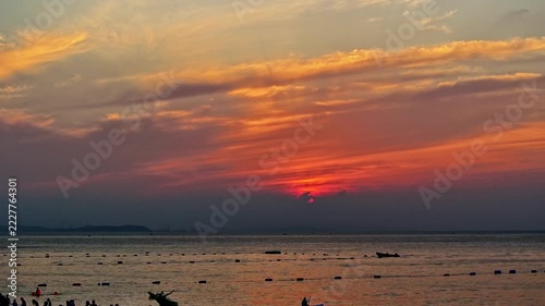 Beautiful and splendid summer rain after a long sunset over the sea time lapse