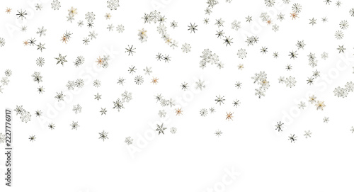 Festive winter background with sparkling golden and silver snowflakes against a dark backdrop.