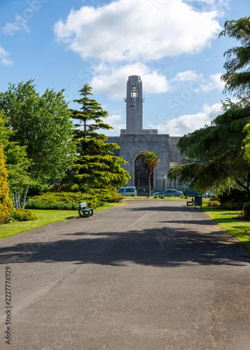 Ornamental gardens and the modernist clocktower of the Guildhall beyond, Swansea, Wales, UK