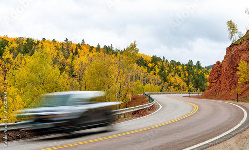 Motion blur racing car on a remote Colorado pass