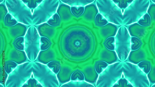 Vibrant teal and green abstract kaleidoscope pattern background with symmetrical geometric design.