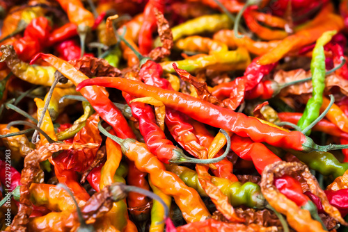 Colorful chili peppers in a farmers market.