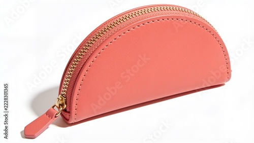 Pink leather clutch purse with gold zipper on white background