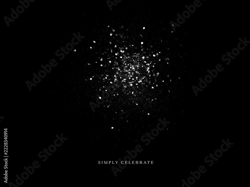 Particles bursting on a black background. Simply celebrate text typography. Abstract festive confetti and stardust overlay concept.