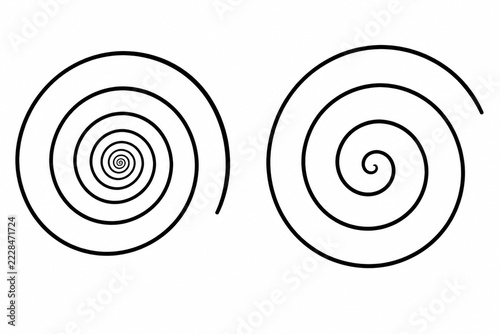 A spiral pattern contracting towards its center beside an expanding spiral.