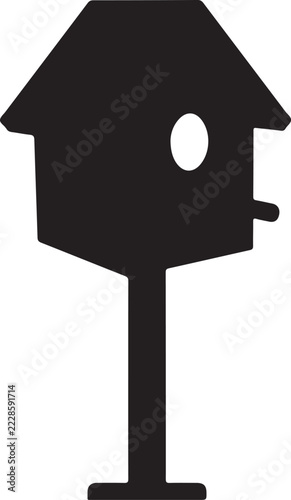 Silhouette of a birdhouse on a pole simple vector illustration for nature and garden themes isolated on white background