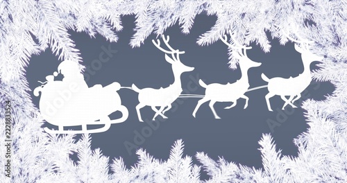 Gliding Santa silhouette in Santa suit, riding sleigh with three reindeer, framed by pine branches