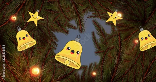 Framing kawaii yellow bell ornament with metal cap on festive Christmas tree, warm lights and stars