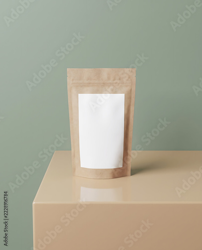 Kraft stand up pouch mock up with blank white label on beige display pedestal