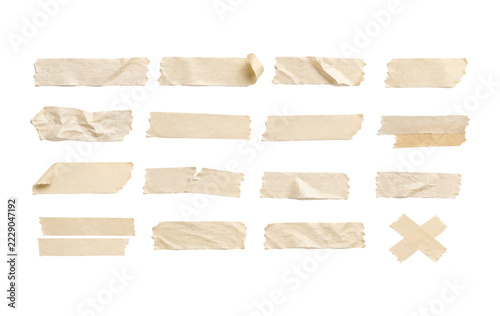 Beige masking tape texture collection with wrinkled adhesive strips isolated on white background