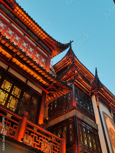 Photography Traditional Chinese Temple Architecture with Illuminated Wooden Details Against