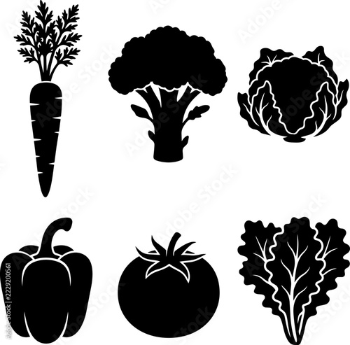 Vegetable icon set with carrot broccoli cabbage bell pepper tomato and lettuce leaves in black silhouette