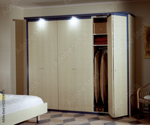Single shot photo of a room with a wardrobe