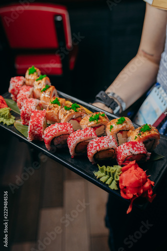 Sushi Rolls Served on Tray in Restaurant