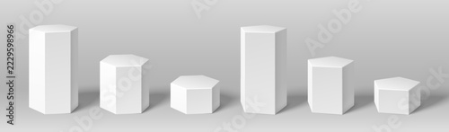White hexagonal podiums with geometric pentagon platforms. Vector minimalist 3D display shapes for luxury cosmetic presentations and modern plinth mockup designs. Elegant realistic marble pillars set.