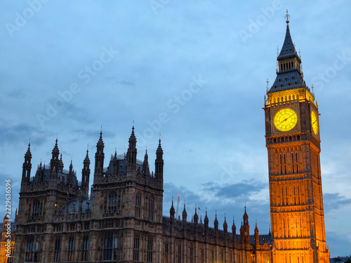 view of the illuminated Big Ben clock tower, Elizabeth Tower, and Houses of Parliament in London, United Kingdom