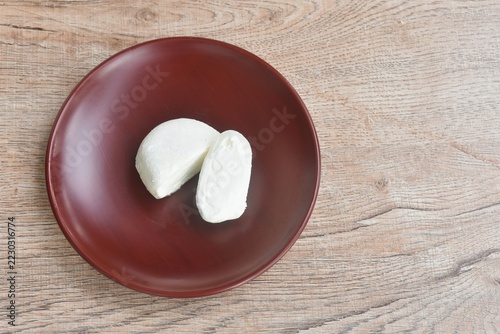 mochi stuffed vanilla milk ice cream half cut arranging on plate