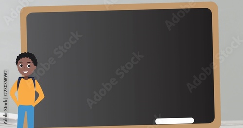 Standing student in class in orange top blue pants and backpack, chalkboard and chalk, copy space