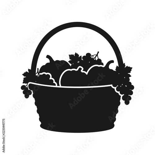 Black silhouette vector illustration of a basket filled with autumn harvest pumpkins and grapes