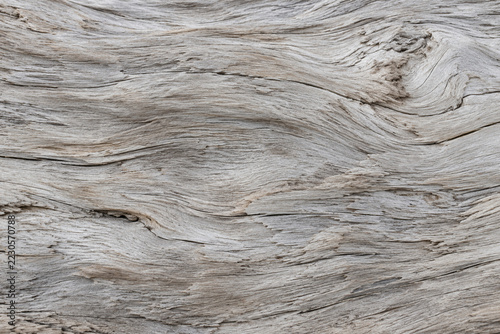 Weathered pale driftwood with flowing natural grain