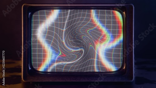 Displaying CRT television producing grid warp from signal, on glossy tabletop with vortex